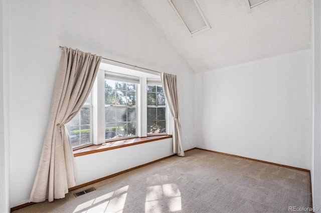 3094 W 107th Pl Unit B, Westminster, CO 80031 - unfurnished room featuring carpet, vaulted ceiling, and attic access