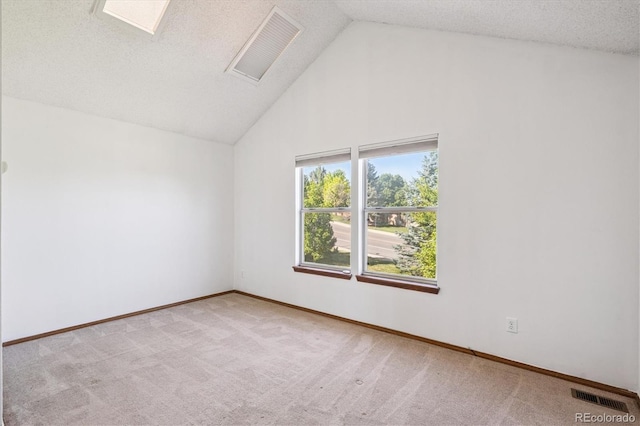 3094 W 107th Pl Unit B, Westminster, CO 80031 - spare room with carpet floors, high vaulted ceiling, and a textured ceiling
