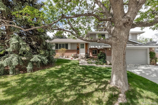 6211 S Garfield Dr, Centennial, CO 80121 - split level home featuring brick siding, an attached garage, driveway, and a front yard