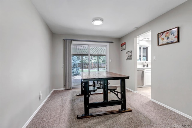 6211 S Garfield Dr, Centennial, CO 80121 - dining room with light colored carpet and baseboards