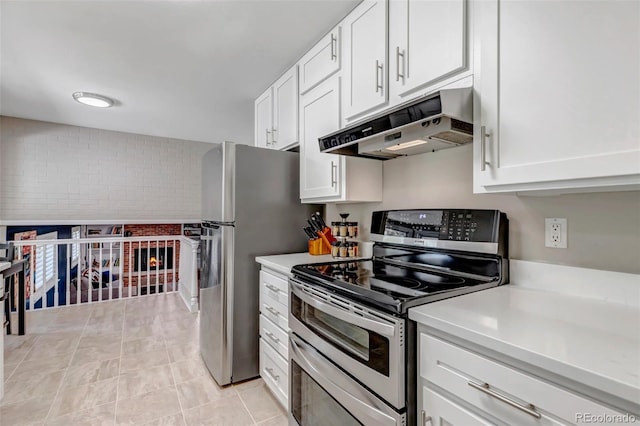 6211 S Garfield Dr, Centennial, CO 80121 - kitchen with under cabinet range hood, appliances with stainless steel finishes, light countertops, and white cabinetry