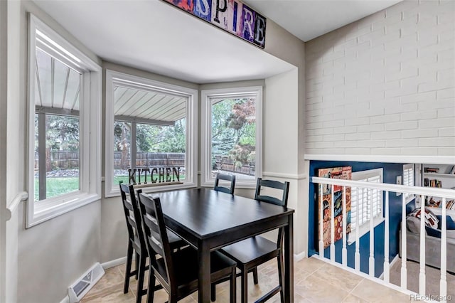 6211 S Garfield Dr, Centennial, CO 80121 - dining space with healthy amount of natural light and baseboards