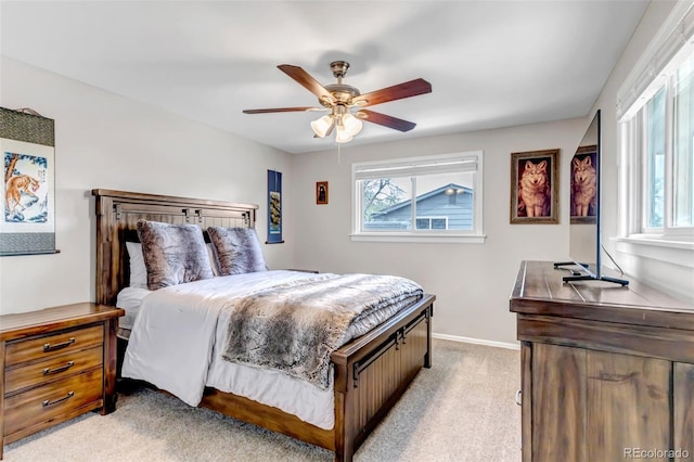 6211 S Garfield Dr, Centennial, CO 80121 - bedroom featuring light colored carpet, baseboards, and ceiling fan