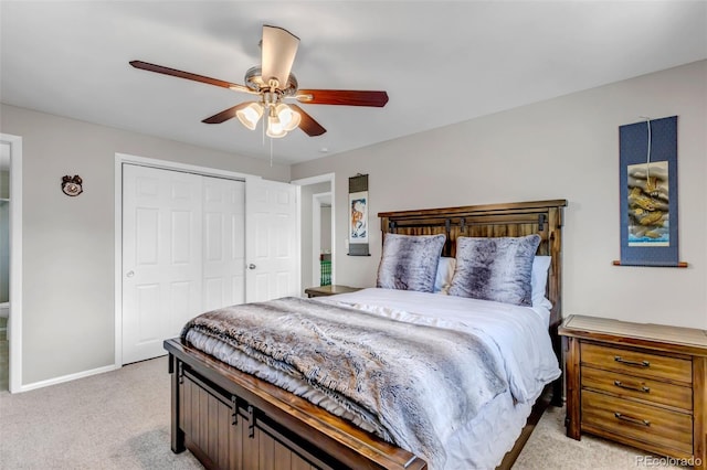 6211 S Garfield Dr, Centennial, CO 80121 - bedroom featuring light colored carpet, a closet, ceiling fan, and baseboards