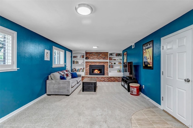 6211 S Garfield Dr, Centennial, CO 80121 - carpeted living area with baseboards, a fireplace, and built in features