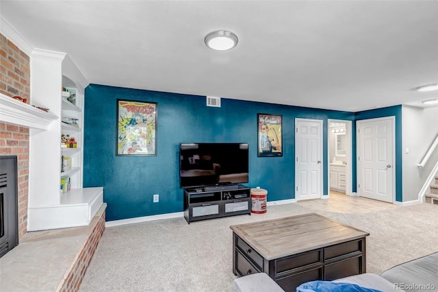 6211 S Garfield Dr, Centennial, CO 80121 - living room with carpet flooring, a fireplace, baseboards, stairway, and built in features