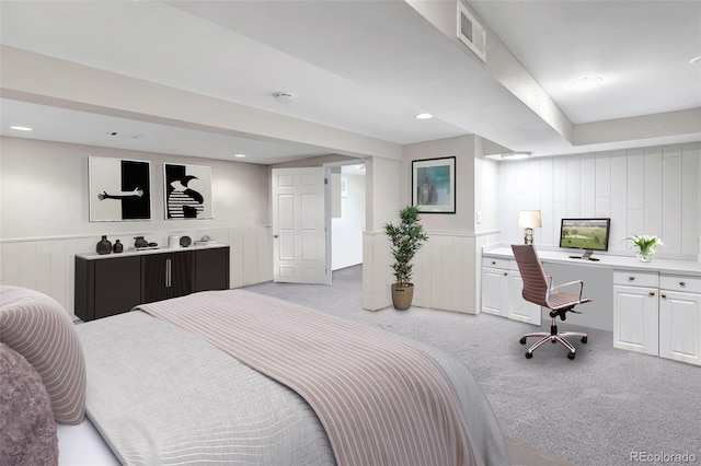 6211 S Garfield Dr, Centennial, CO 80121 - bedroom with light colored carpet and wainscoting