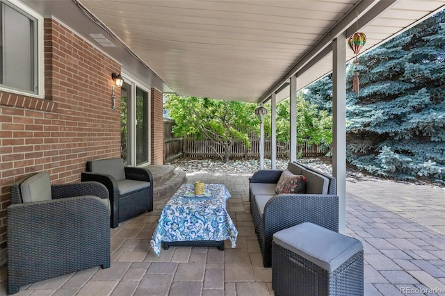 6211 S Garfield Dr, Centennial, CO 80121 - fenced backyard with outdoor lounge area and a patio area