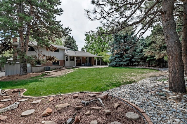 6211 S Garfield Dr, Centennial, CO 80121 - view of yard featuring a patio
