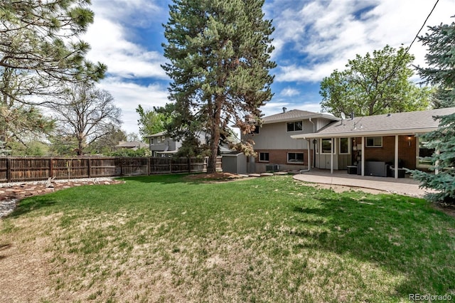 6211 S Garfield Dr, Centennial, CO 80121 - view of yard featuring a patio