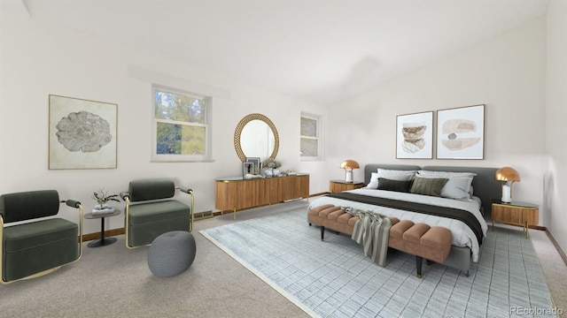 carpeted bedroom with vaulted ceiling