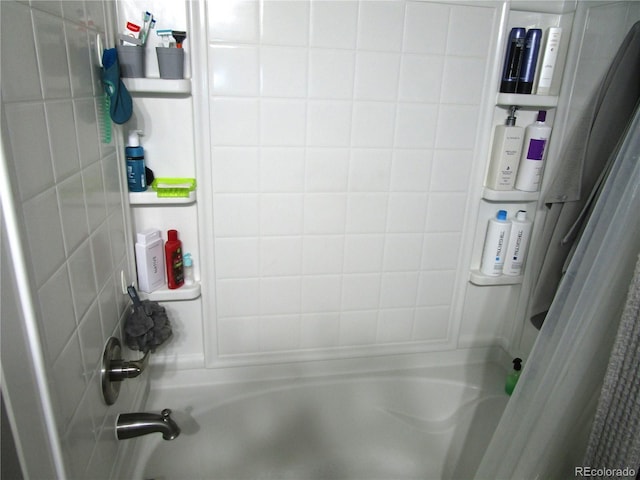 bathroom featuring shower / bathtub combination with curtain