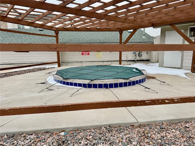 view of pool featuring a pergola