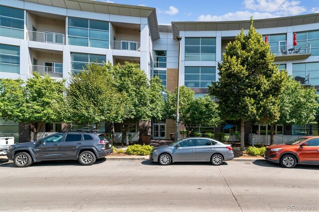 2958 Syracuse St Unit 214, Denver, CO 80238 - view of building exterior featuring uncovered parking