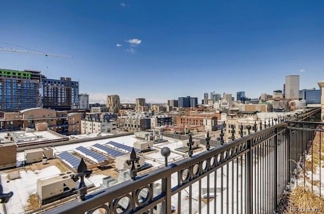 balcony featuring a city view