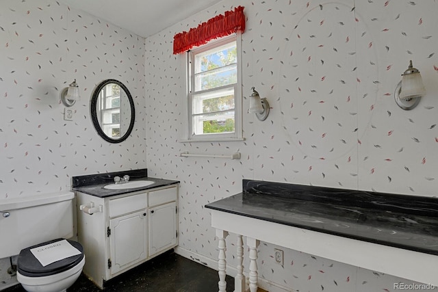 bathroom with vanity and toilet