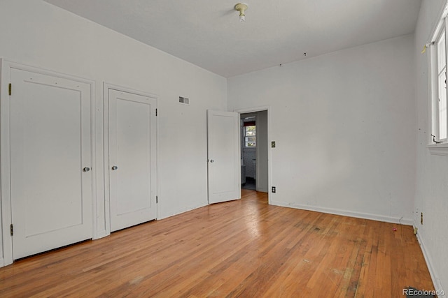 unfurnished bedroom featuring light hardwood / wood-style flooring