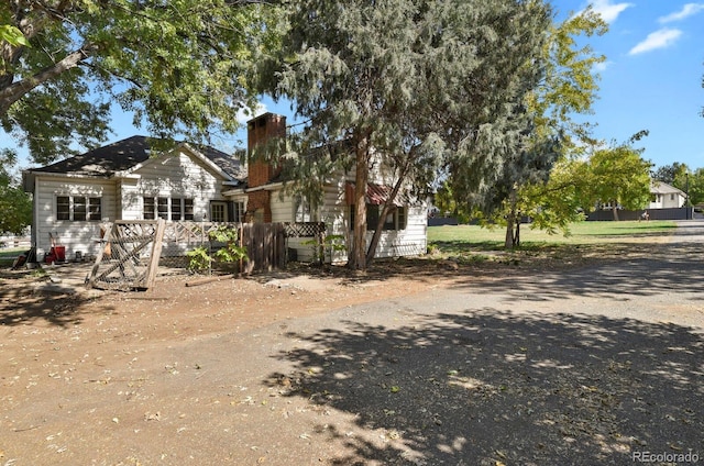 577 96th St, Louisville, CO 80027 - view of front of house with a chimney