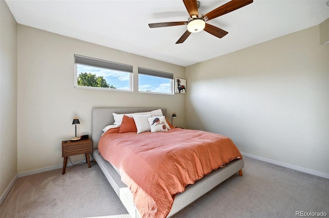 920 S Locust St Unit E, Denver, CO 80224 - bedroom featuring light carpet and a ceiling fan