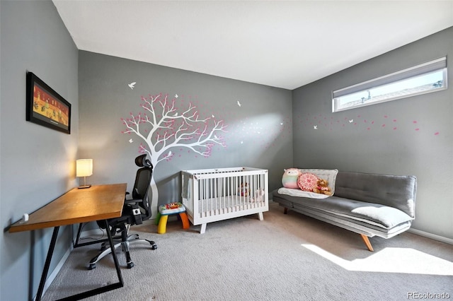 920 S Locust St Unit E, Denver, CO 80224 - carpeted bedroom with an office area and a crib