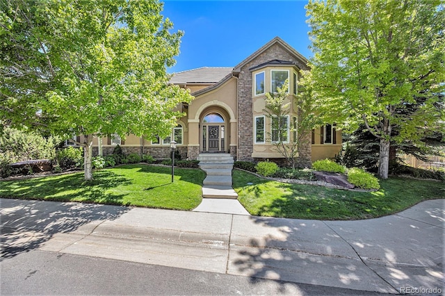 view of front of house with a front yard