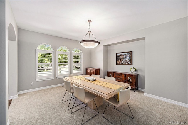 view of carpeted dining area