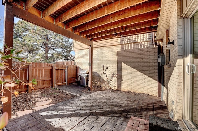 view of patio featuring a grill