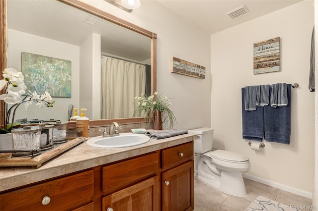 full bathroom featuring tile patterned flooring, visible vents, vanity, and toilet