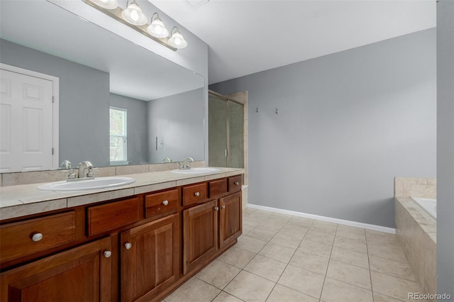 full bathroom featuring tile patterned flooring, a sink, double vanity, and a shower stall