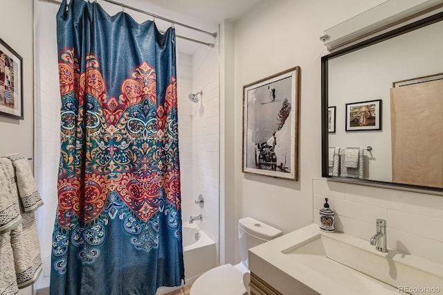 3632 N Pecos St, Denver, CO 80211 - full bathroom featuring shower / bathtub combination with curtain, decorative backsplash, vanity, and toilet