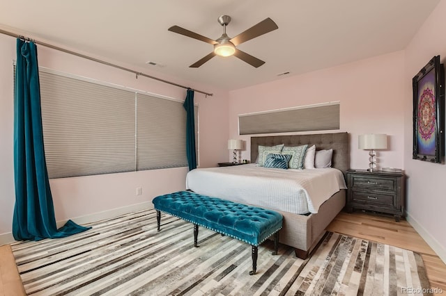 3632 N Pecos St, Denver, CO 80211 - bedroom featuring wood finished floors, baseboards, and a ceiling fan