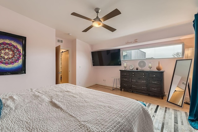 3632 N Pecos St, Denver, CO 80211 - bedroom featuring light wood finished floors and a ceiling fan