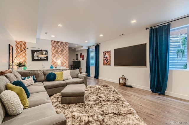 3632 N Pecos St, Denver, CO 80211 - living room featuring wood finished floors, baseboards, recessed lighting, and wet bar