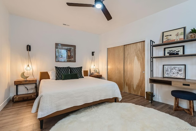 3632 N Pecos St, Denver, CO 80211 - bedroom featuring a closet, wood finished floors, baseboards, and a ceiling fan