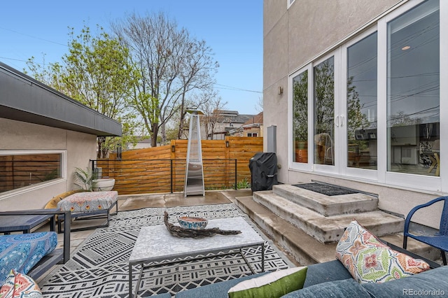 3632 N Pecos St, Denver, CO 80211 - view of patio / terrace featuring a grill, entry steps, and french doors