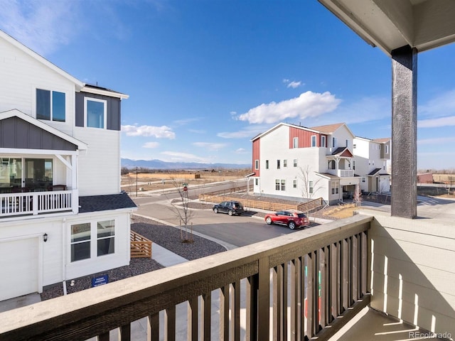 balcony featuring a residential view