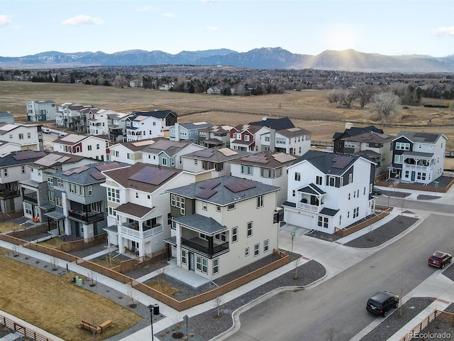 bird's eye view with a residential view and a mountain view