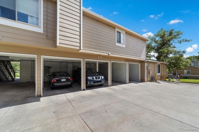 view of side of property with a garage