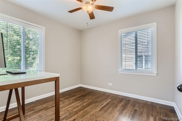 1171 Syracuse St, Denver, CO 80220 - unfurnished room featuring baseboards, ceiling fan, dark wood-style floors, and a desk