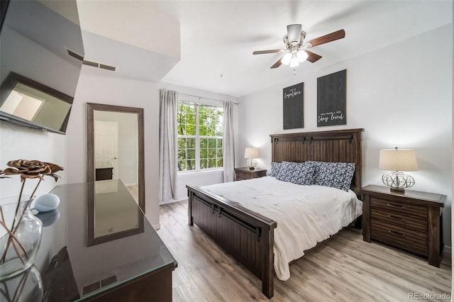 bedroom featuring light wood-type flooring and ceiling fan