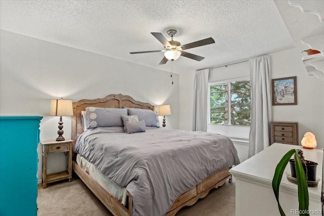 4194 S Kalispell St, Aurora, CO 80013 - bedroom with light colored carpet, a textured ceiling, and ceiling fan