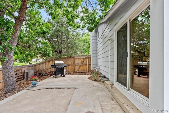 4194 S Kalispell St, Aurora, CO 80013 - fenced backyard featuring a patio area and a grill