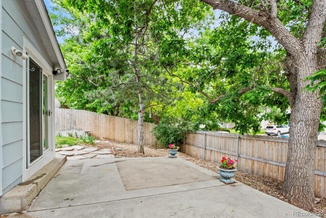 4194 S Kalispell St, Aurora, CO 80013 - fenced backyard with a patio