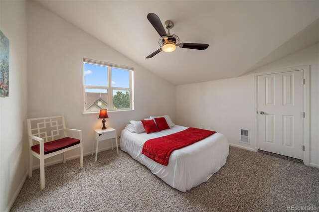 5465 Zephyr St Unit 201, Arvada, CO 80002 - bedroom with vaulted ceiling, carpet flooring, and ceiling fan
