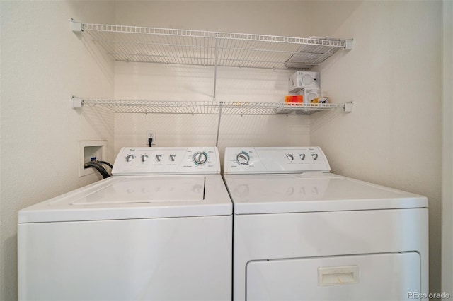 5465 Zephyr St Unit 201, Arvada, CO 80002 - laundry area featuring washing machine and dryer
