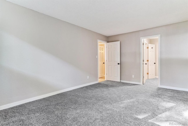 unfurnished bedroom with carpet floors