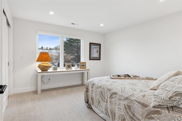 bedroom with light carpet, baseboards, visible vents, and recessed lighting