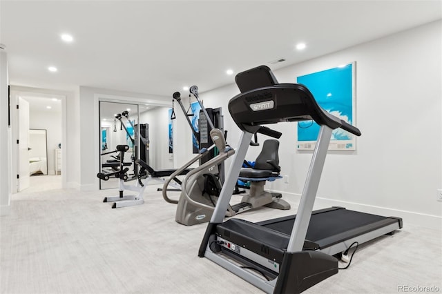 workout area with light carpet, baseboards, and recessed lighting