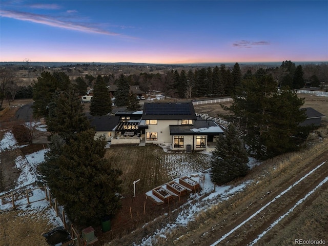 view of aerial view at dusk