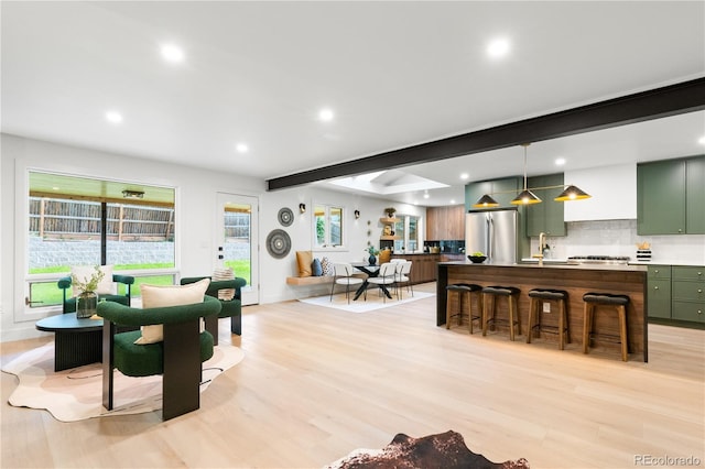11010 W 29th Ave, Lakewood, CO 80215 - living area with recessed lighting, light wood-style flooring, and beam ceiling